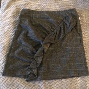 grey mini skirt w/ silver accents & cross ruffle